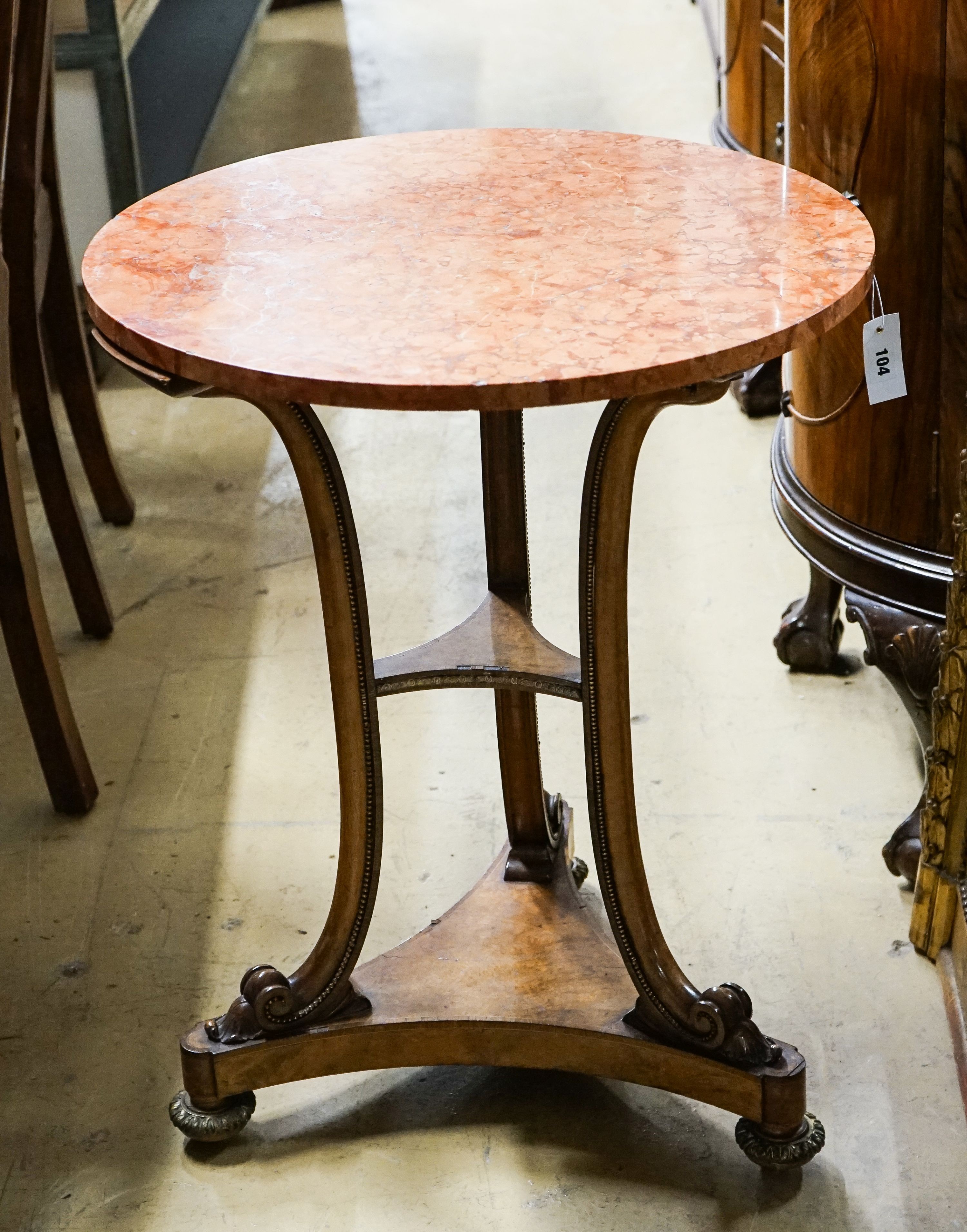 A Victorian gilt metal mounted walnut circular marble top table, diameter 60cm, height 73cm